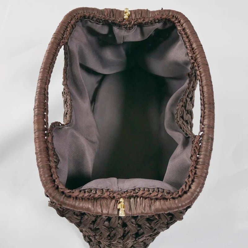 Sophia flätad clutch i halm och snäckskal