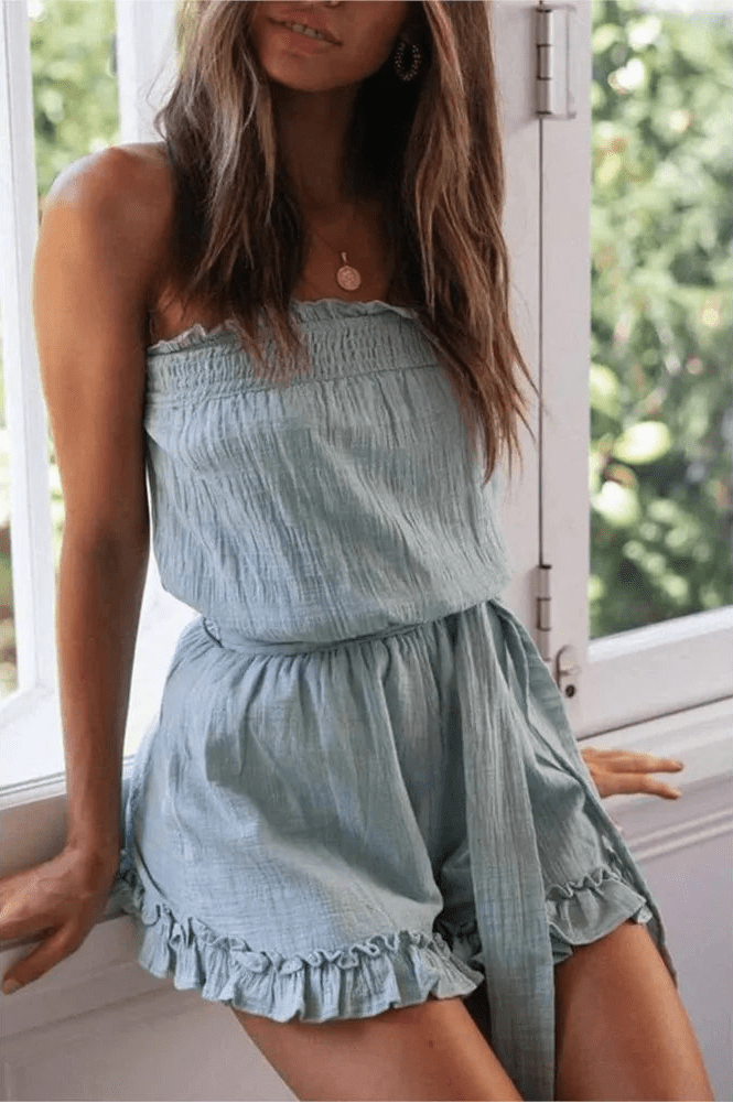 Sophie axelbandslösa jumpsuit med skärp