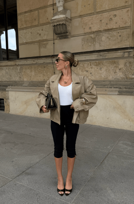 Isabel dubbelknäppt kappa i fusk-läder