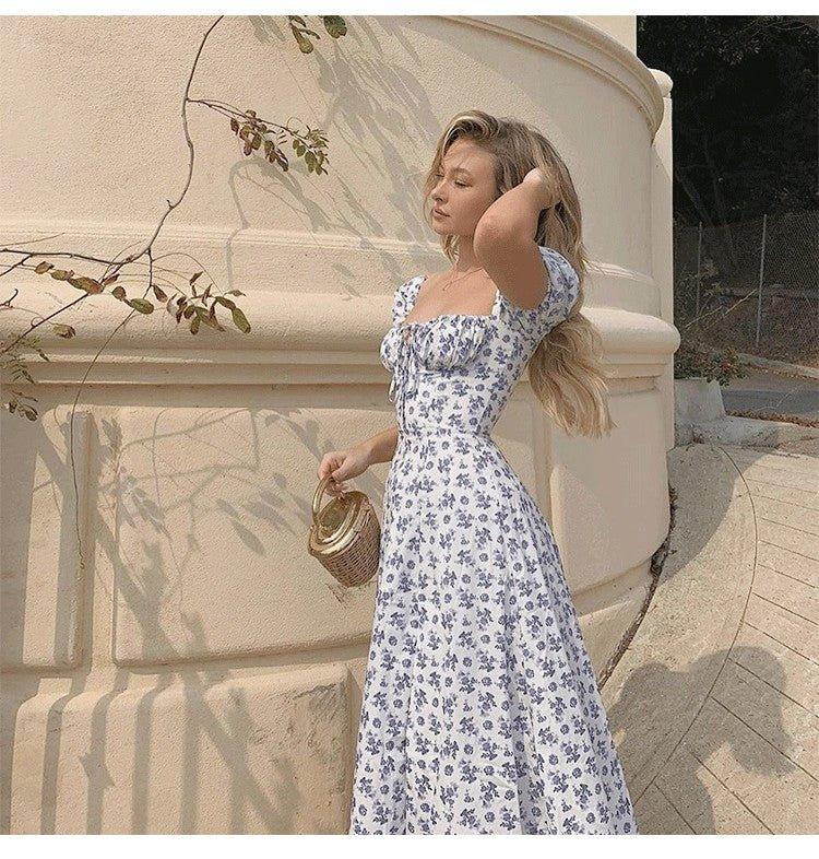 Arianna midiklänning med puffärm och blommönster