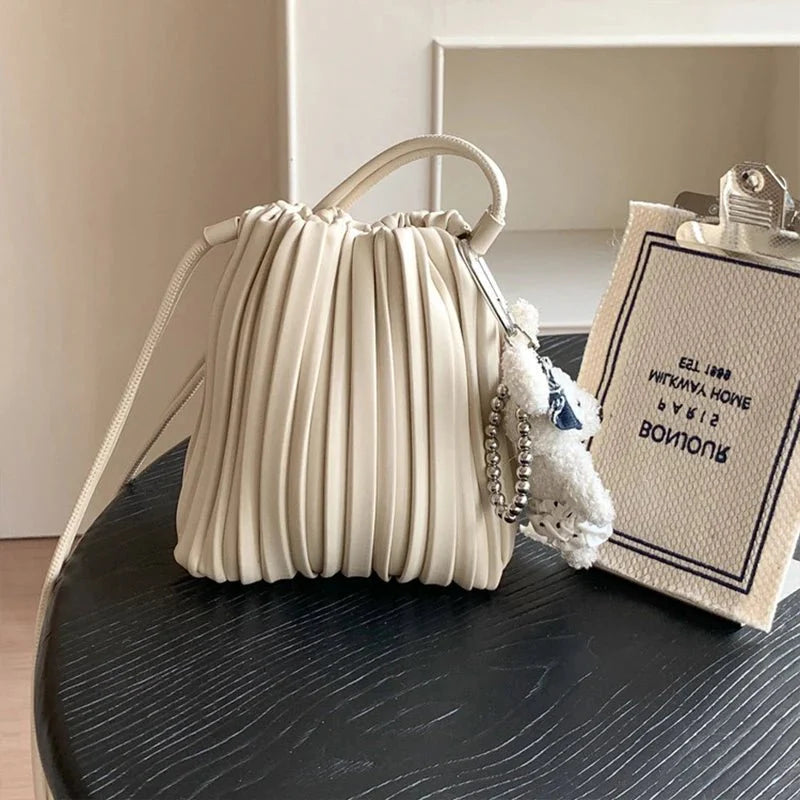 Sadie plisserad mini crossbody-väska