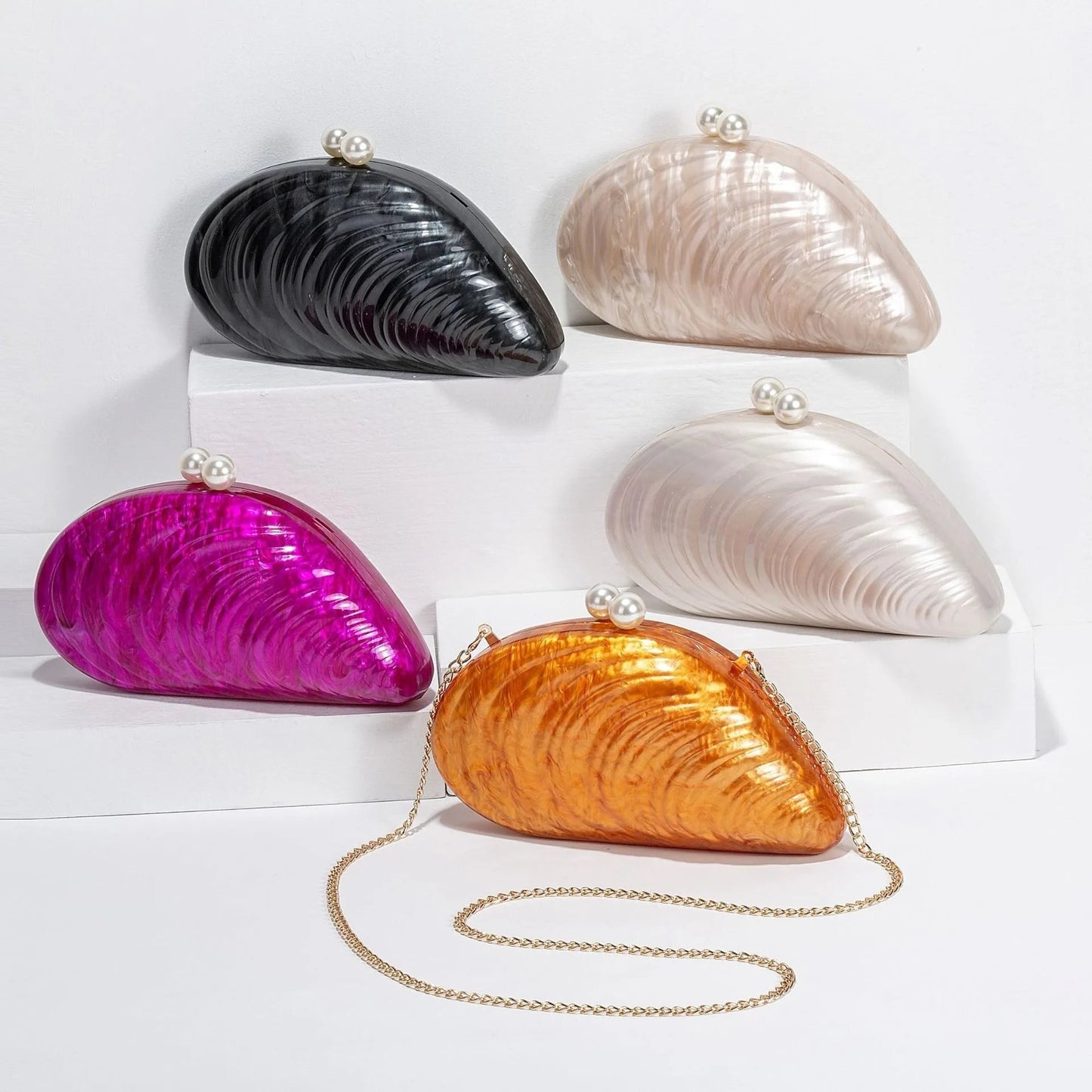 Sophia Snäckformad Clutch