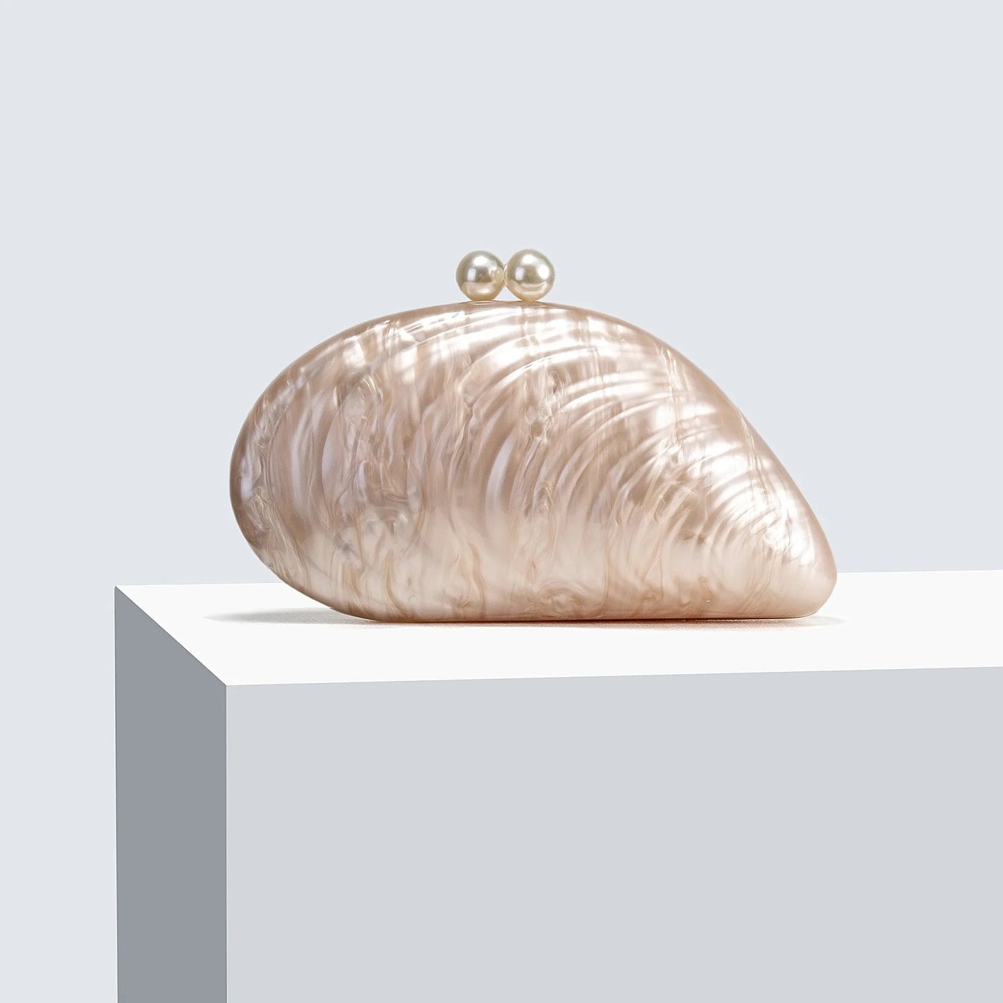 Sophia Snäckformad Clutch