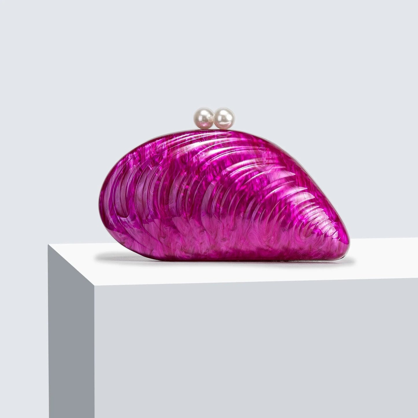 Sophia Snäckformad Clutch