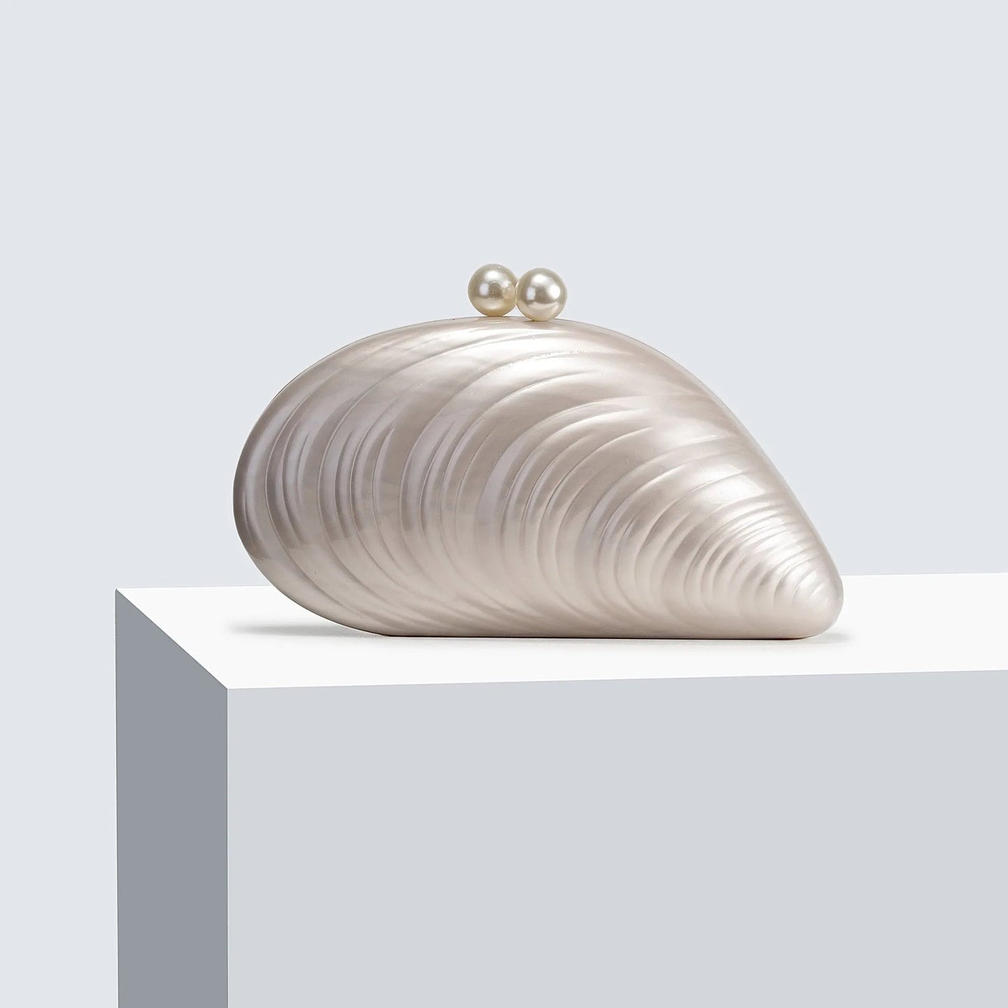 Sophia Snäckformad Clutch
