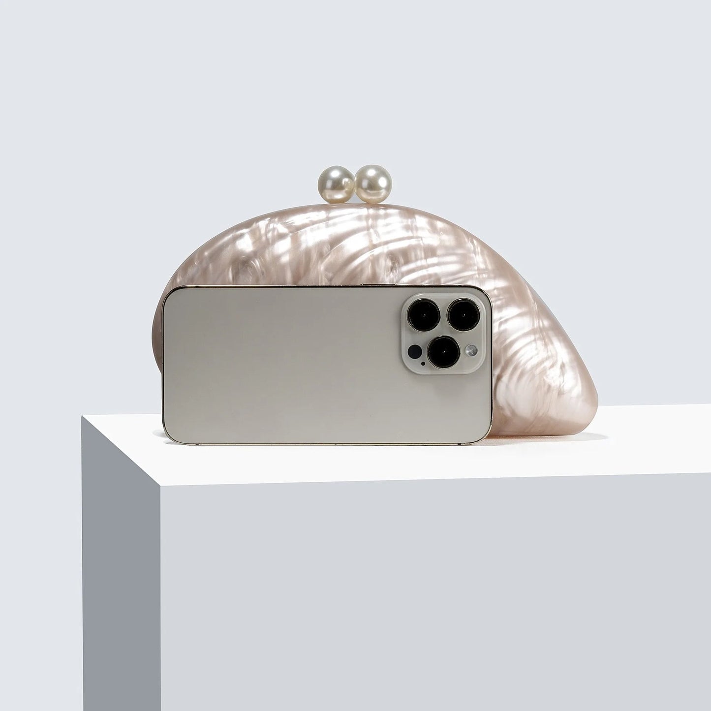 Sophia Snäckformad Clutch