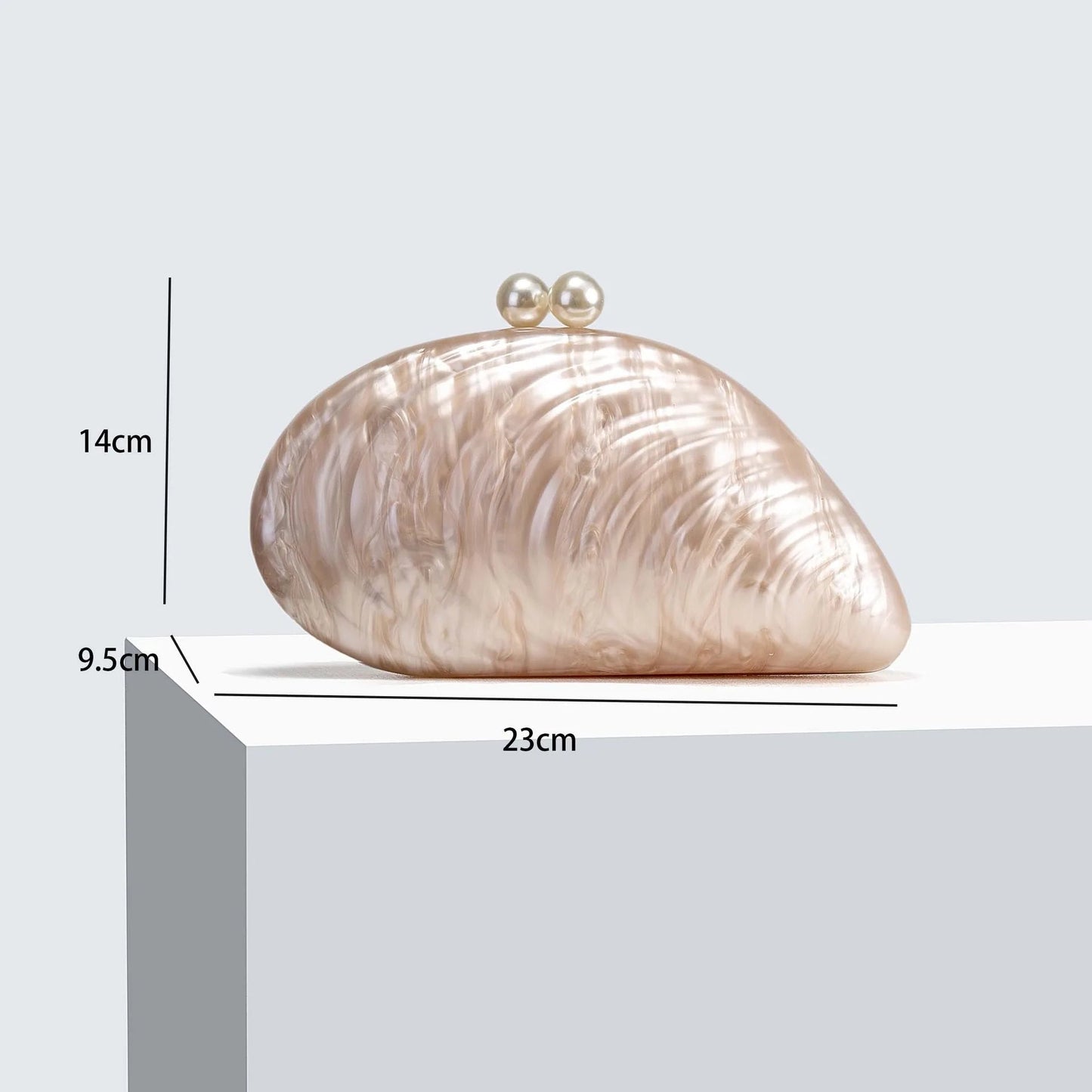 Sophia Snäckformad Clutch