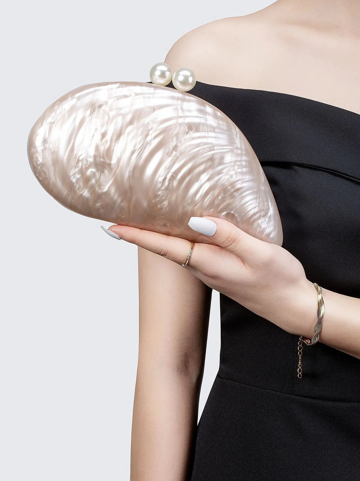 Sophia Snäckformad Clutch