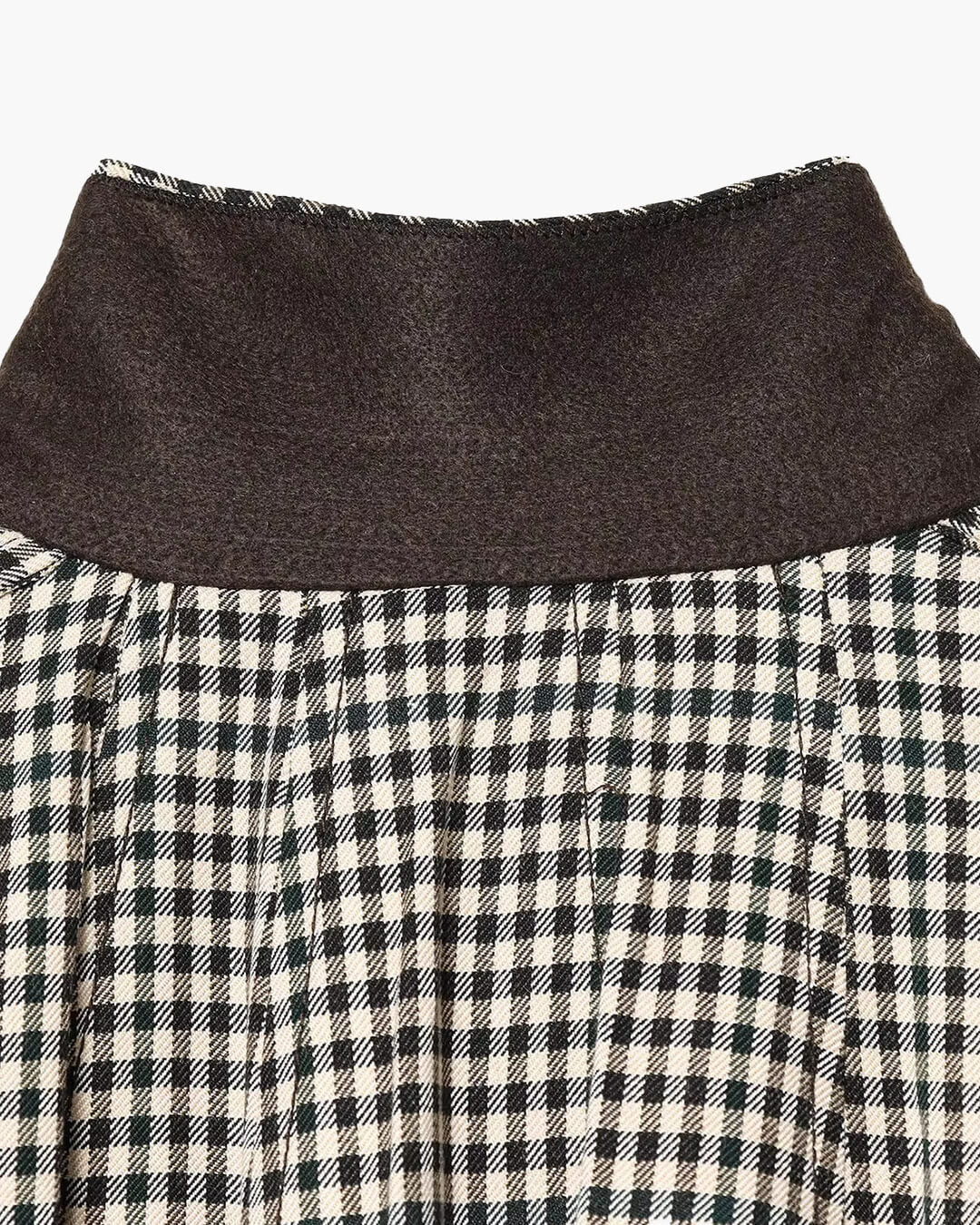 Lisa bomberjacka med hög krage och rutigt mönster