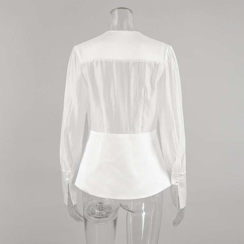 Lydia transparent blus med djup urringning och knappar