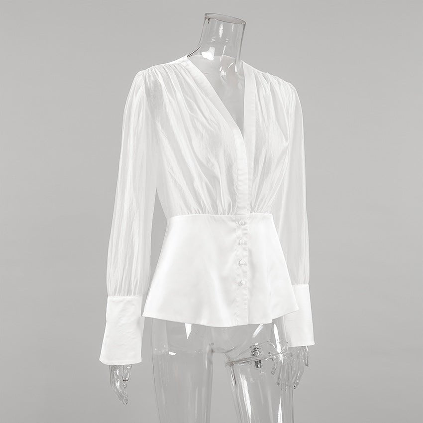 Lydia transparent blus med djup urringning och knappar