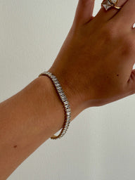 Tennisarmband med baguetteslipad zirkonia