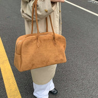 Beatriz Toteväska i mocka
