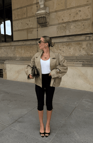Isabel dubbelknäppt kappa i fusk-läder