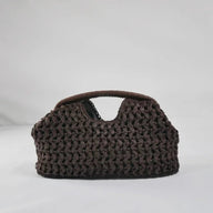 Isabel flätad stråclutch i snäckform